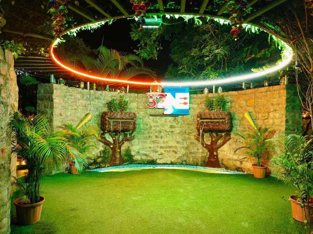 Lawn with ring-light stage and 32 NE sign